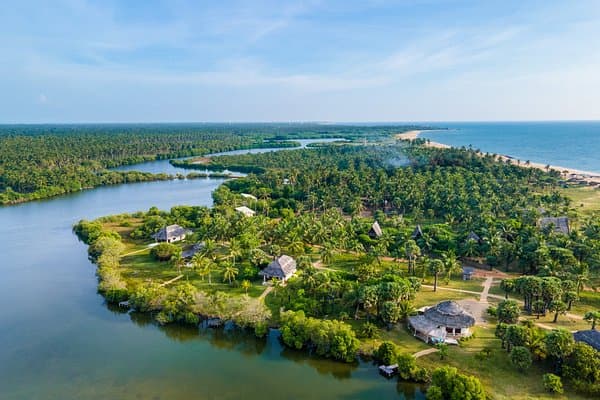 Aerial view of the lagoon winding through the peninsula, with the sea beyond